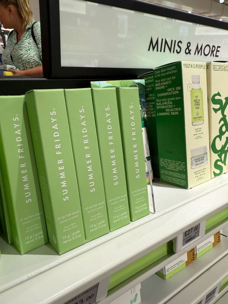 Summer Fridays skincare packaging displayed on a retail shelf, showing consistent colour, typography and product navigation.
